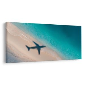 CANVAS SCHILDERIJ AZUURBLAUWE KUST MET VLIEGTUIG - SCHILDERIJEN ZEE EN STRAND - SCHILDERIJEN