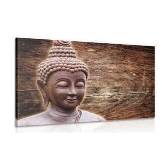 CANVAS PRINT BUDDHA STATUE ON A WOODEN BACKGROUND - PICTURES FENG SHUI - PICTURES
