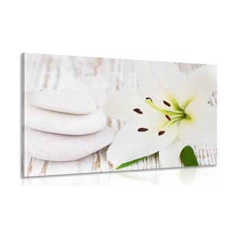 Picture of lilies and massage stones in white