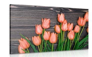 IMPRESSION SUR TOILE CHARMANTES TULIPES ORANGE SUR UN ARRIÈRE-PLAN EN BOIS - IMPRESSIONS SUR TOILE FLEURS - IMPRESSION SUR TOILE