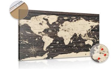 Slika na pluti zemljevid sveta na lesenem ozadju
