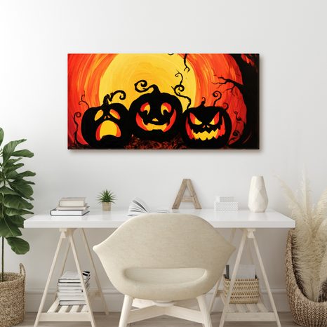 WANDBILD UNHEIMLICHE KÜRBISSE UNTER DEM MOND - HALLOWEEN- UND HORROR-BILDER - BILDER