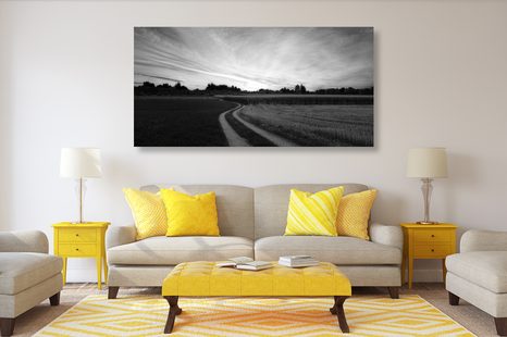 WANDBILD UNTERGEHENDE SONNE ÜBER DER LANDSCHAFT IN SCHWARZ-WEISS - SCHWARZ-WEISSE BILDER - BILDER