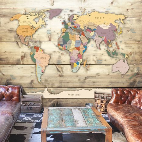 SELF ADHESIVE WALLPAPER WORLD MAP ON A WOODEN BACKGROUND