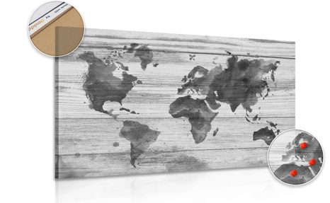PICTURE OF A CORK OUTLINE BLACK & WHITE MAP ON A WOODEN BACKGROUND