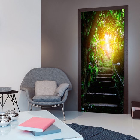 PHOTO WALLPAPER ON THE DOOR WITH A MOTIF OF STAIRS IN THE URBAN JUNGLE