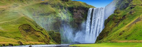 WANDBILD IKONISCHER WASSERFALL IN ISLAND - BILDER VON WASSERFÄLLEN - BILDER