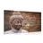 Picture of Buddha statue on wooden background