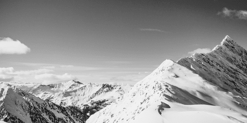 CANVAS PRINT OF SNOWY MOUNTAINS IN BLACK AND WHITE - BLACK AND WHITE PICTURES - PICTURES