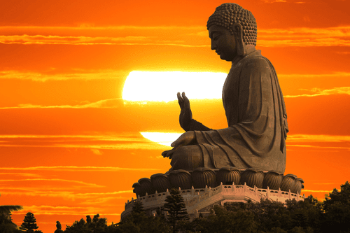 WANDBILD BUDDHA-STATUE BEI SONNENUNTERGANG - BILDER MIT FENG SHUI-MOTIVEN - BILDER