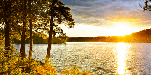 WANDBILD SONNENUNTERGANG ÜBER DEM SEE - BILDER VON NATUR UND LANDSCHAFT - BILDER