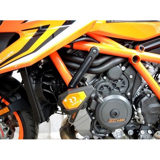 PADACÍ SLIDERY RDMOTO KTM13N BÍLÝ POLYAMID SE STŘÍBRNÝMI KRYTKAMI