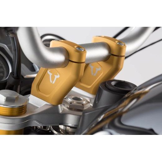 SW MOTECH ZVÝŠENÍ ŘÍDÍTEK 20 MM NAHORU A ZPĚT 30 MM. ZLATÝ. OD BMW.