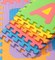 Puzzle podložka Sportago Easy-Lock 30x30x1 cm, 26 ks, písmená