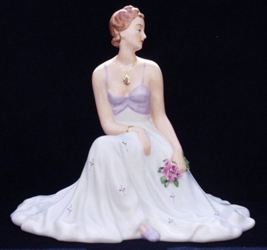 Lady sitting with roses 18 x 23 x 20 cm, Porcelain Figures Duchcov