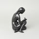 Dívka s ptáčkem a copem 18,5 x 12 x 12 cm, fond černý, Porcelánové figurky Duchcov