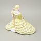 Lady with book, middle 22,5 x 32,5 x 26,5 cm, yellow decor, Royal Dux Bohemia