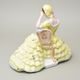 Lady with book, middle 22,5 x 32,5 x 26,5 cm, yellow decor, Royal Dux Bohemia