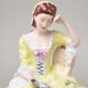 Lady with book, middle 22,5 x 32,5 x 26,5 cm, yellow decor, Royal Dux Bohemia