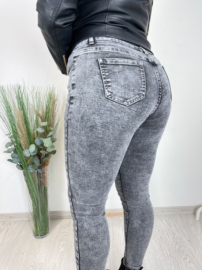 Skinny džíny se zapínáním na knoflíky a trháním šedé