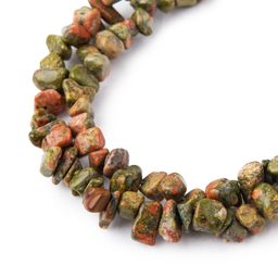 Úlomky minerálu unakit 80cm