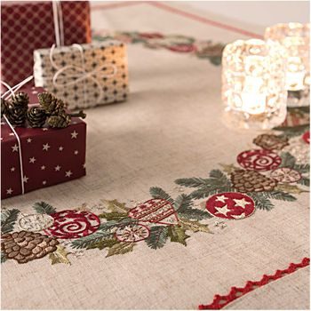Embroidery kit for a tablecloth with a Christmas decoration with ornaments motif