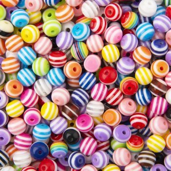 Colourful plastic beads with stripes