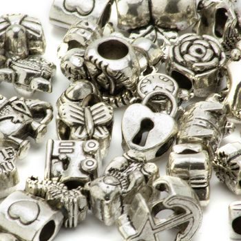 Metal beads and charms mix shapes with wide center holes