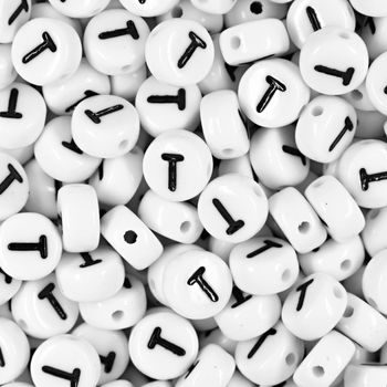 White plastic bead 7x4 mm with letter T