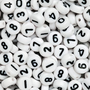 White mix of plastic beads 7x4 mm with numbers