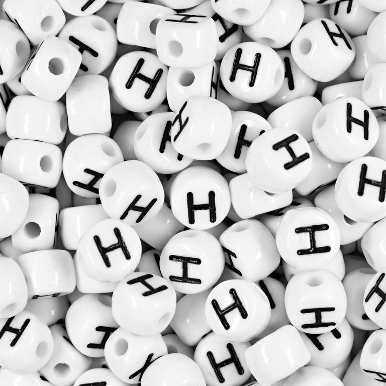 White plastic bead 7x5 mm with letter H