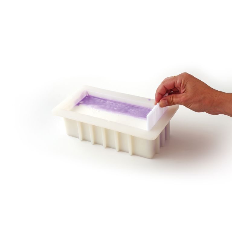 Silicone mould with separators for making soap