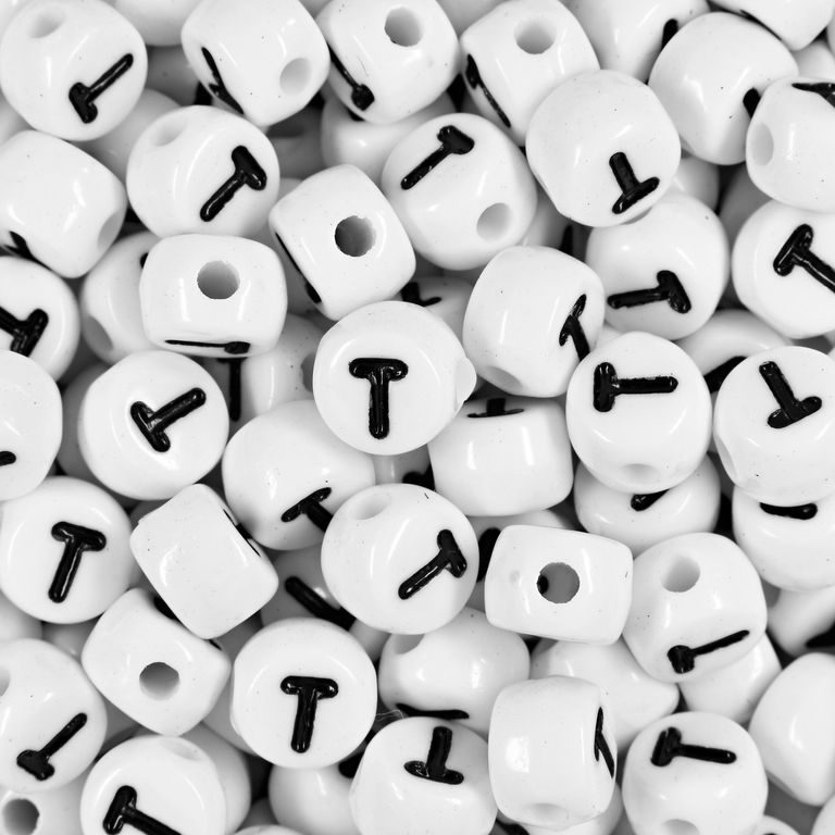 White plastic bead 7x5 mm with letter T