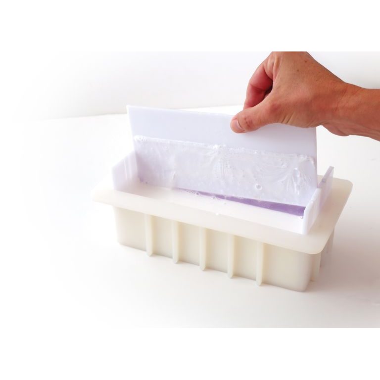 Silicone mould with separators for making soap