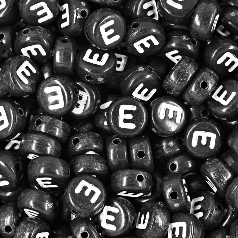 Black plastic bead 7x4 mm with letter E