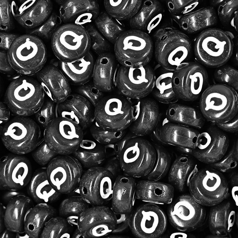 Black plastic bead 7x4 mm with letter Q