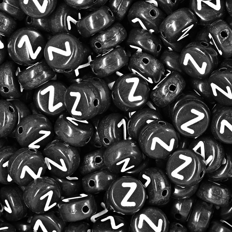 Black plastic bead 7x4 mm with letter Z