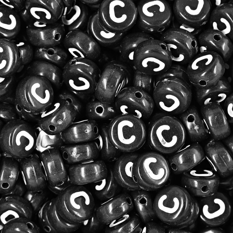 Black plastic bead 7x4 mm with letter C