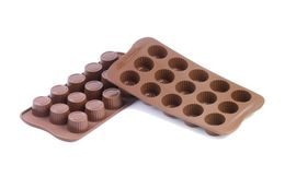 Chocolate moulds on a sheet - Praline