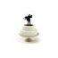 Silhouette of newlyweds in arms - wedding cake figures