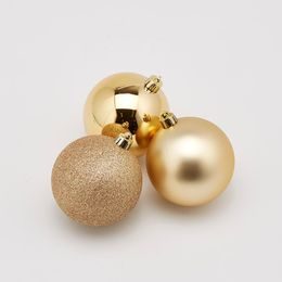 Vánoční skleněná ozdoba s bílým dekorem zlatá 1ks, 10 cm