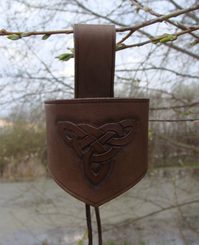 LEATHER HORN HOLDER, hand carved knots