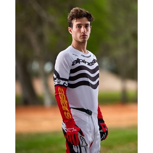 ALPINESTARS TECHSTAR LIMITOVANÁ EDÍCIA DEEP – MOTOKROSOVÉ NOHAVICE NA MX A ENDURO (ČIERNA/BIELA/ČERVENÁ FLUO/ORANŽOVÁ) 2025
