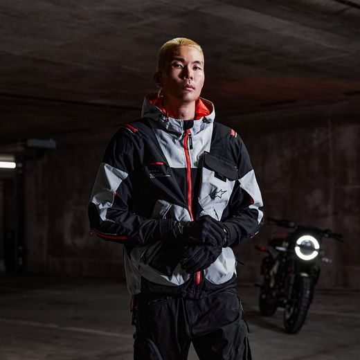BUNDA MOGRESS AIR, ALPINESTARS (ČERNÁ/MANDLOVÁ/ORANŽOVÁ) 2025