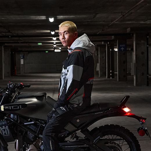 BUNDA MOGRESS AIR, ALPINESTARS (ČERNÁ/MANDLOVÁ/ORANŽOVÁ) 2025