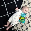 Baby Einstein Hračka aktivní na C kroužku želva Neptune’s Sensory Sidekick™ 0m+