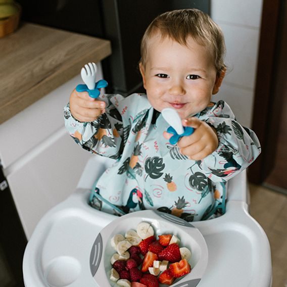 BabyOno Bryndák s rukávy omyvatelný 6m+ TOUCANS