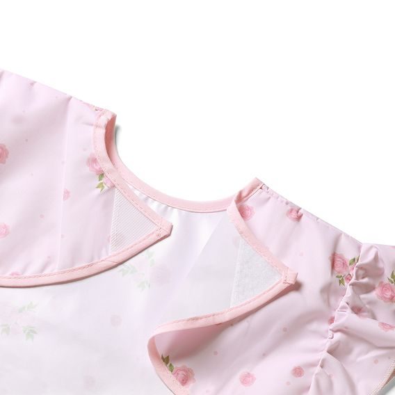 BabyOno Omyvatelný bryndák zástěrka 6m+ RŮŽOVÝ KYTIČKY