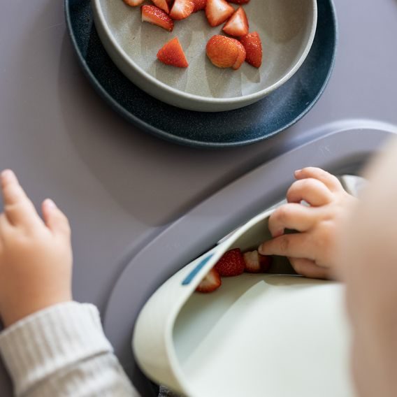 LOVI Silikonový bryndák s kapsou Pistachio