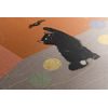 Obraz umelecké stvárnenie hravej čiernej mačky